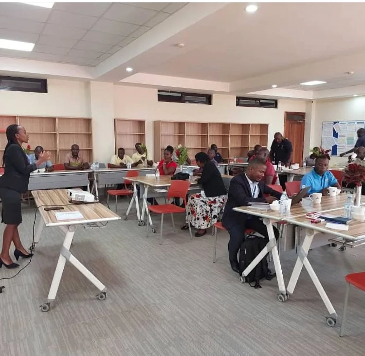 Peninah facilitating a workshop for a room of participants